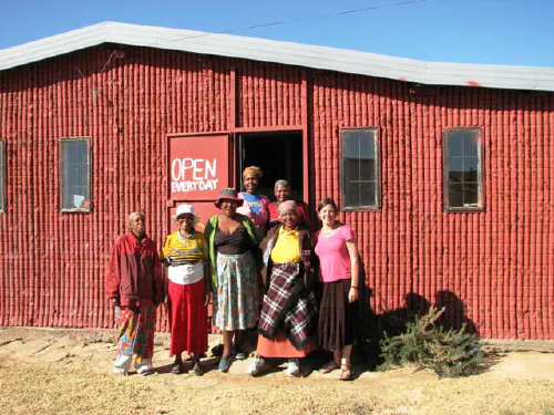 Heather with the weaving ladies in Teyateyaneng