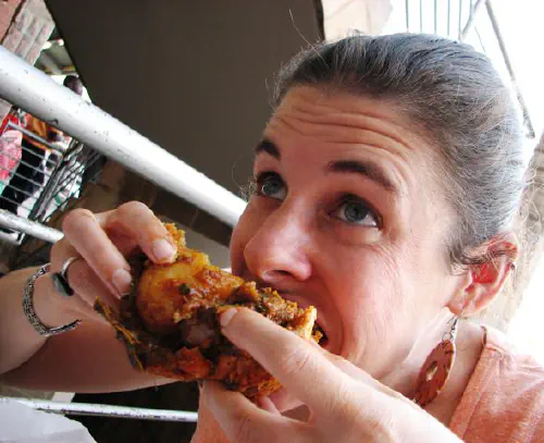Heather eating a bunny chow