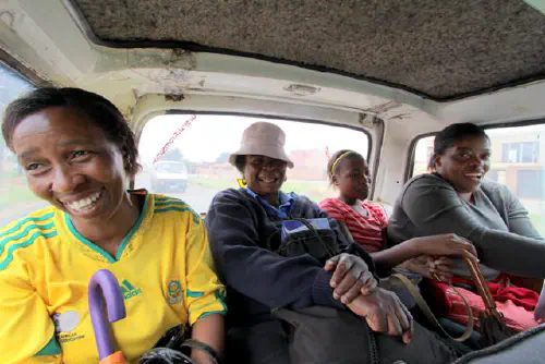 Women in taxi in Soweto