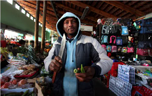 Market stall owner in Yeoville