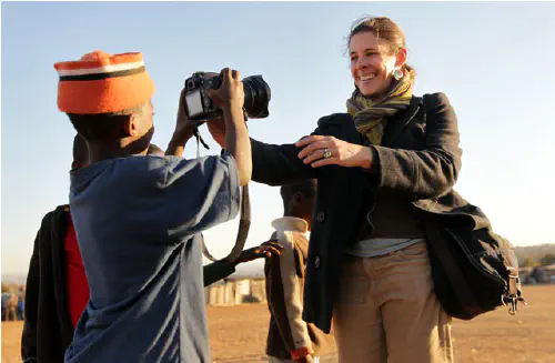 Heather and a kid in Diepsloot
