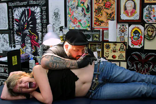 Claire getting a tattoo