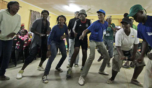 Camp Sizanani counselors dancing
