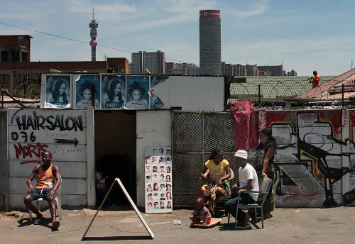 A hair salon with the towers in the background