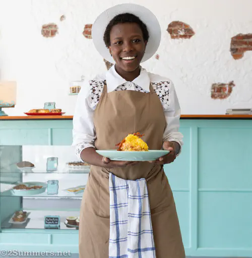 Thandeka of Sweet Tea and Chickadee serves American biscuits to grateful customers like me