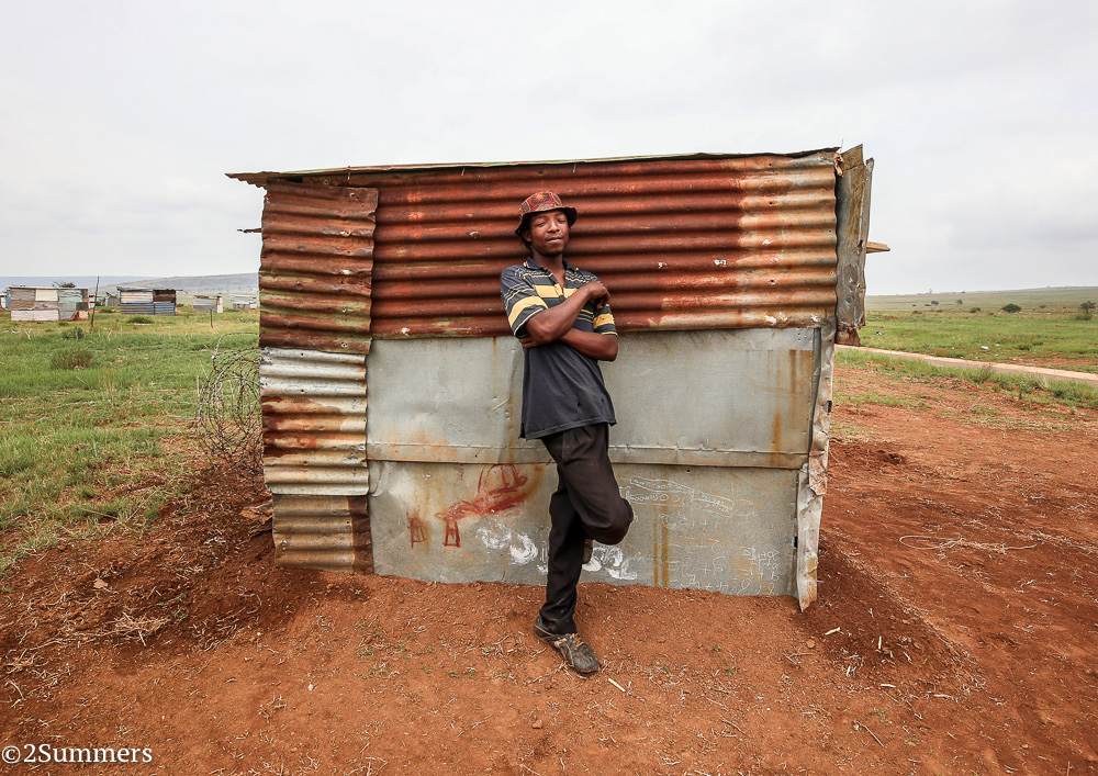 Man with his shack in Lawley Township